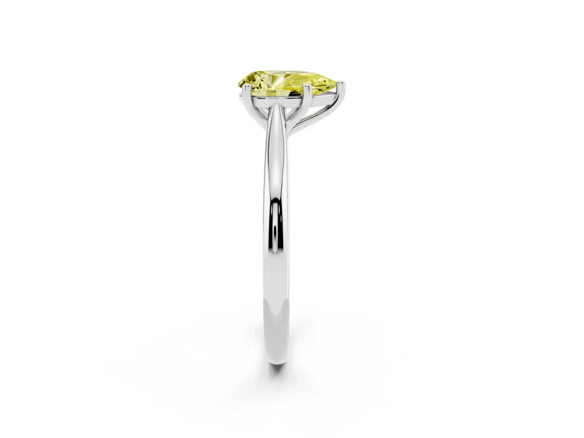 Fancy Yellow Pear Cut Cut Solitaire Ring with Cathedral Band and Four-Prong Setting Silver
