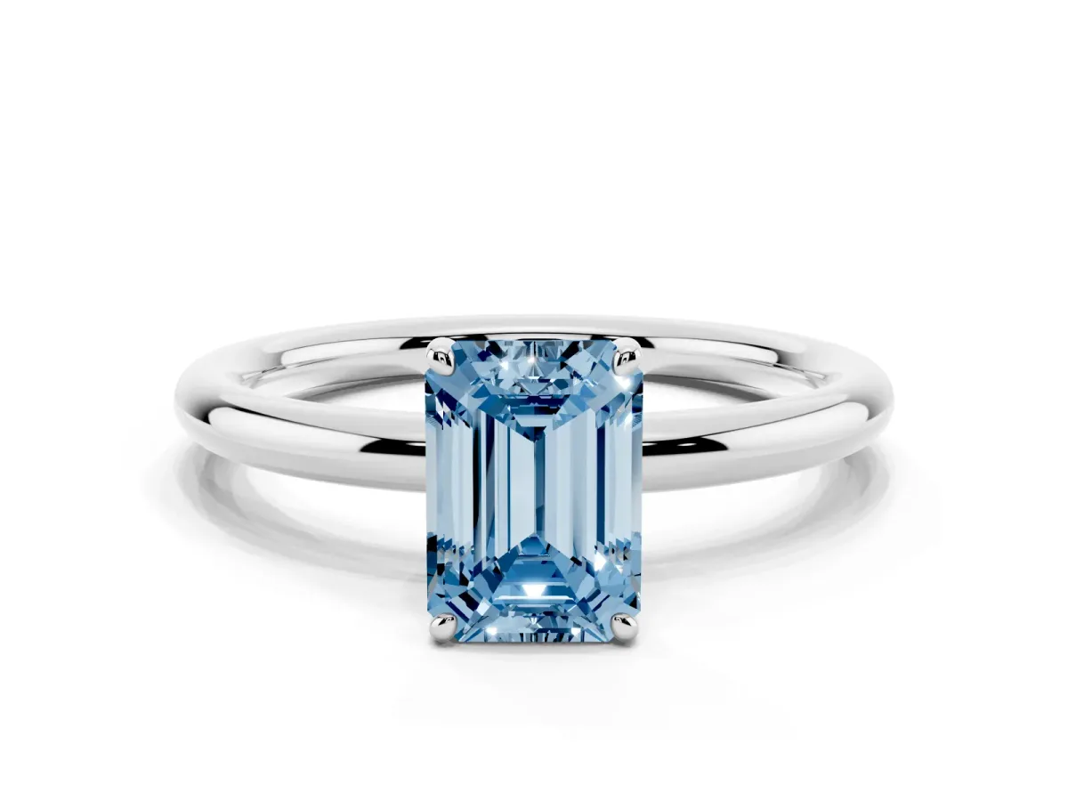 Fancy Blue Emerald Cut Solitaire Diamond Ring with Four-Prong Setting on a Plain Band White gold