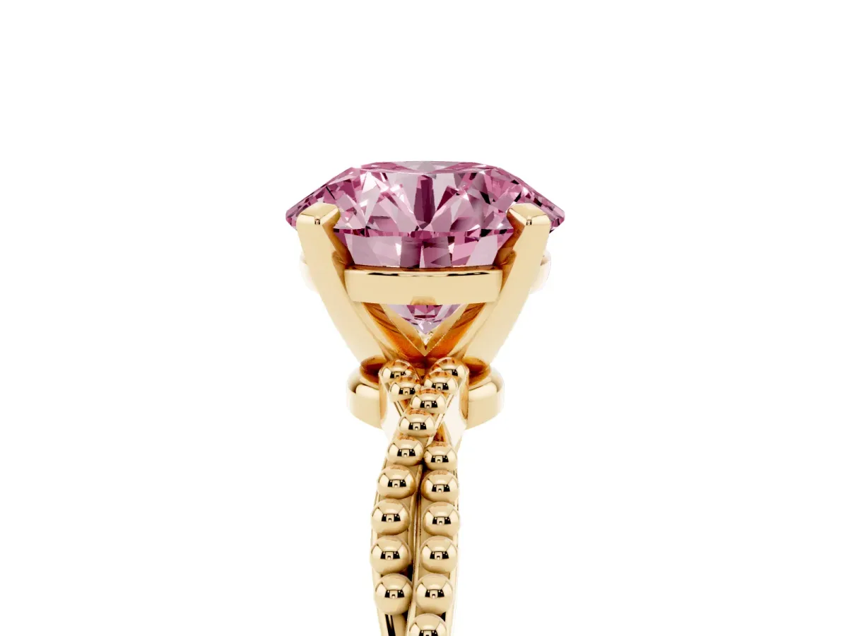 Fancy Pink Round Cut Solitaire Twisted Band with Bead Prong Setting Yellow gold