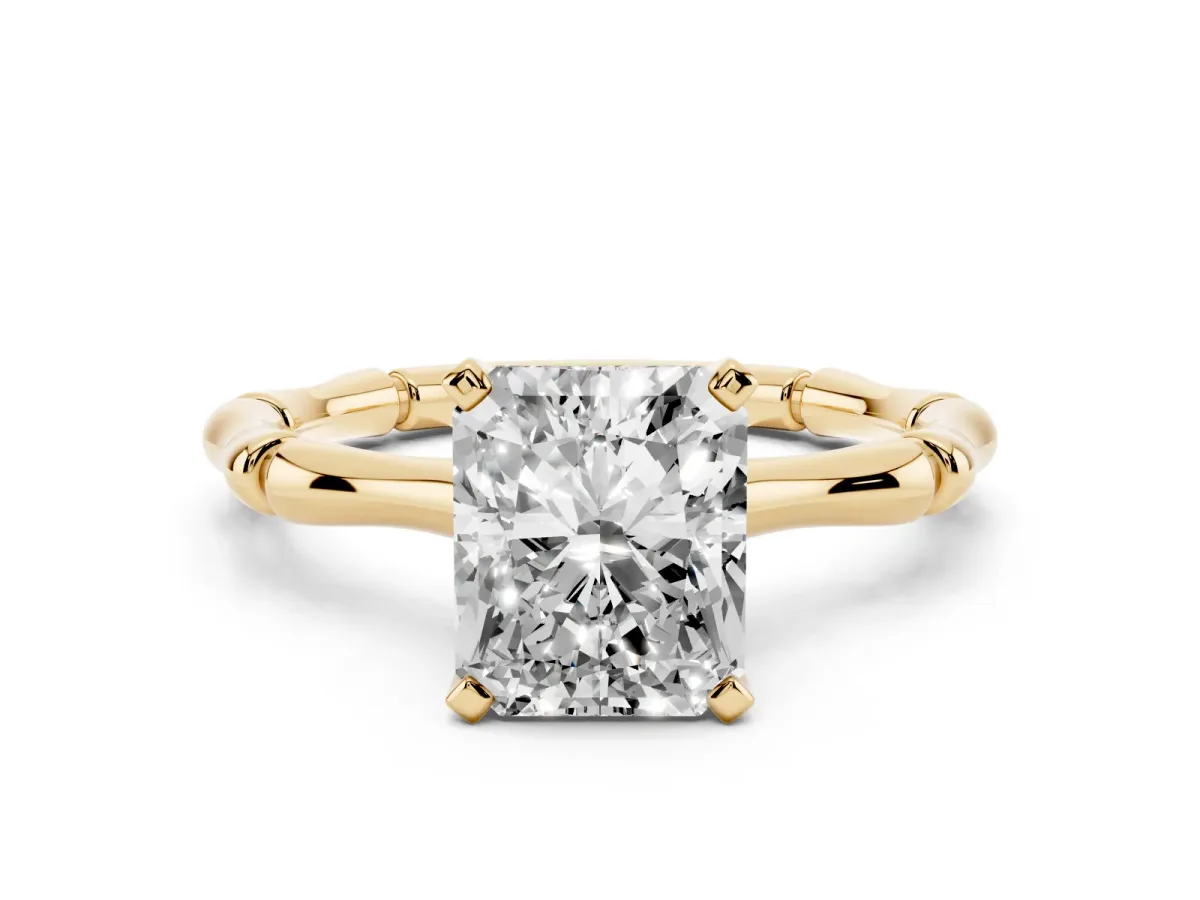 Radiant Cut Solitaire Diamond Ring with Bamboo Band and Four-Prong Setting Yellow gold