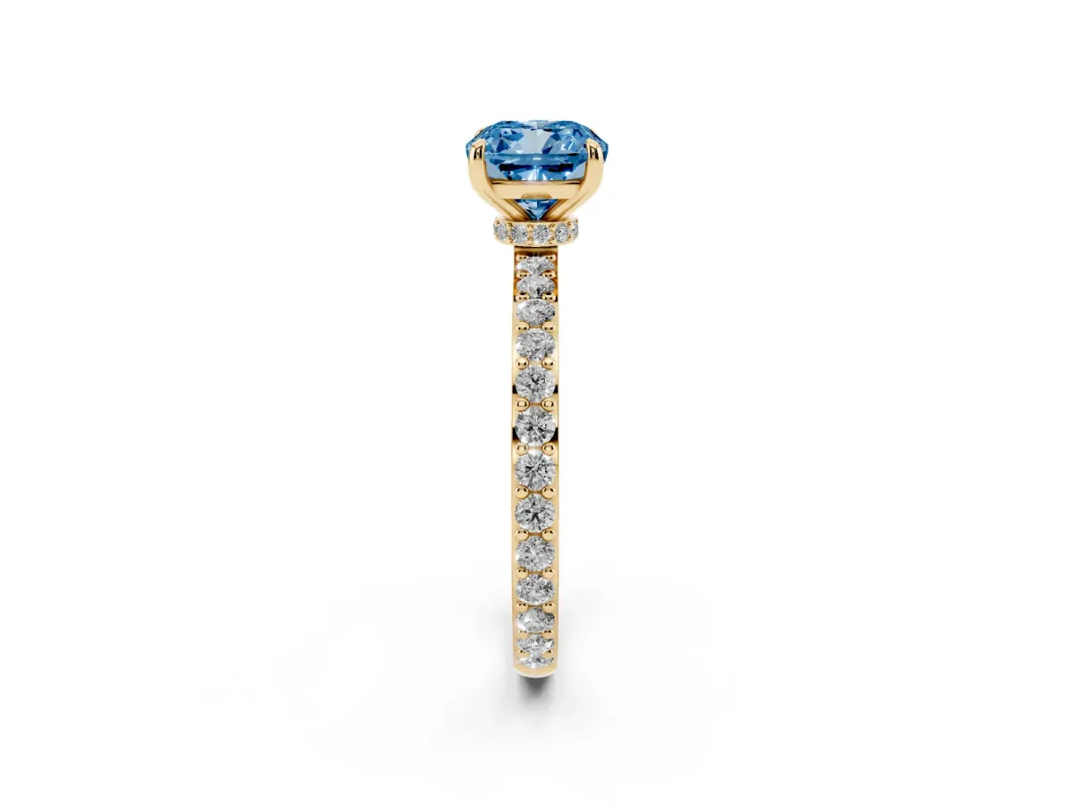 Fancy Blue Cushion Cut Diamond Pavé Engagement Ring with Round Accents and Prong Setting Yellow gold