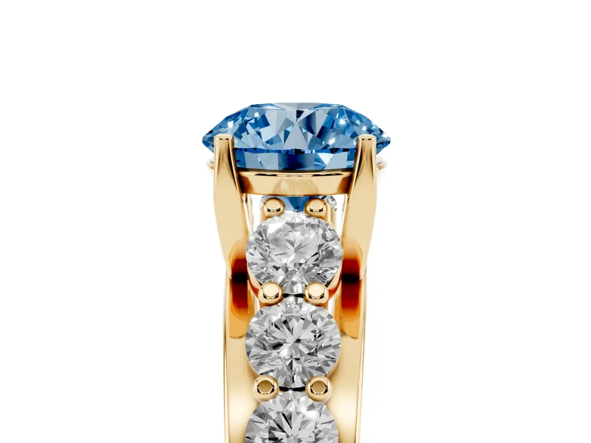 Fancy Blue Round Cut Diamond Engagement Ring with Pavé Band and Four-Prong Setting Yellow gold