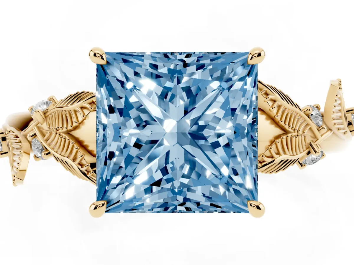 Fancy Blue Princess Cut Diamond Solitaire Ring with Leaf Motif Band and Four-Prong Setting Yellow gold