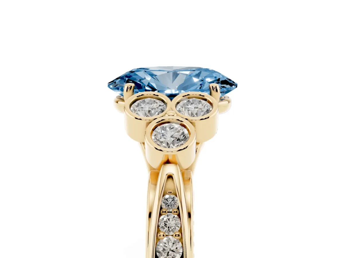 Fancy Blue Oval Cut Cut Diamond Engagement Ring with Bezel Set Round Side Stones and Prong Setting Yellow gold
