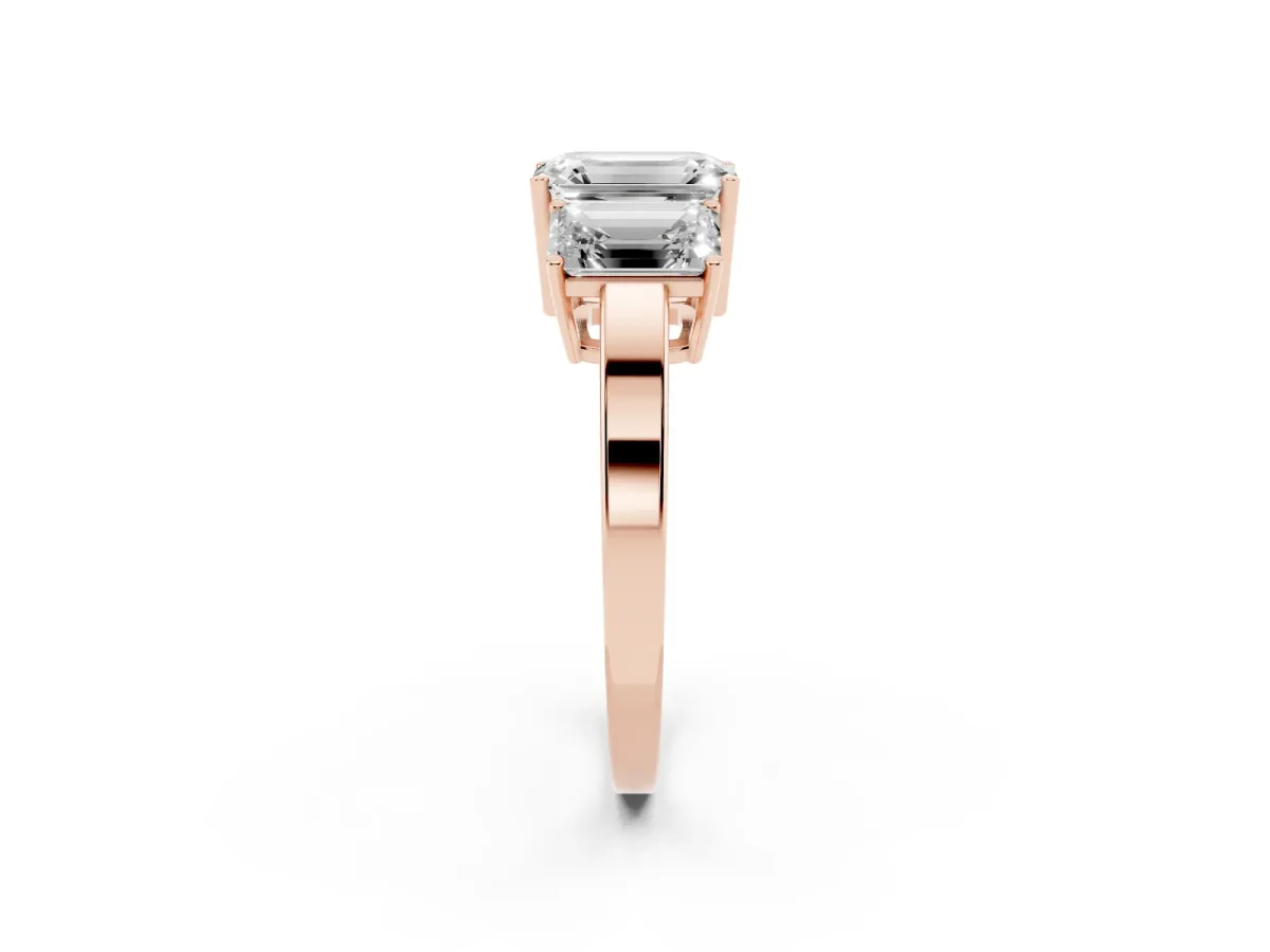Three-Stone Emerald Cut Cut Diamond Engagement Ring with Flat Band and Four-Prong Setting Rose gold