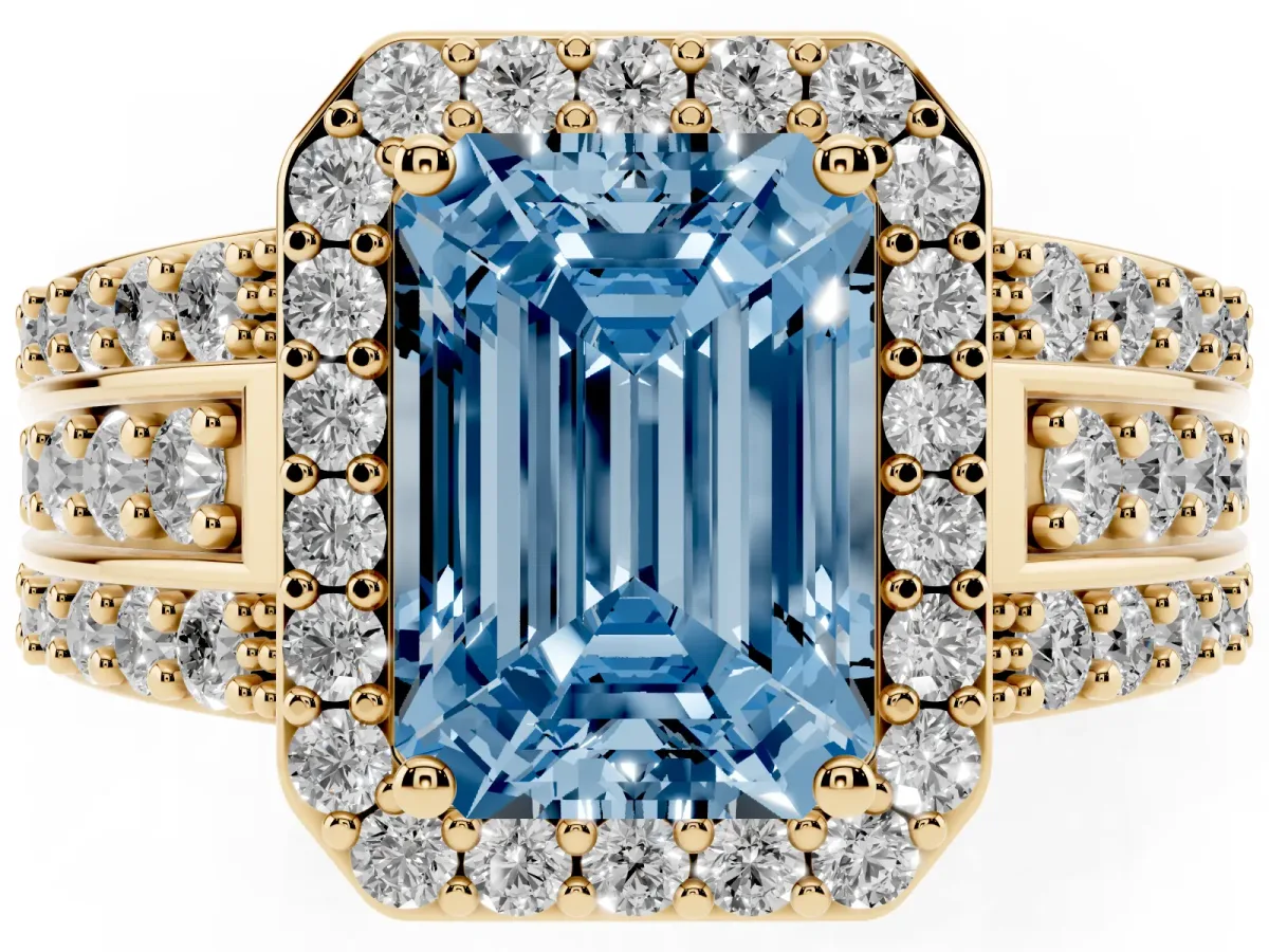 Fancy Blue Emerald Cut Halo Diamond Ring with Round Split Shank and Prong Setting Yellow gold