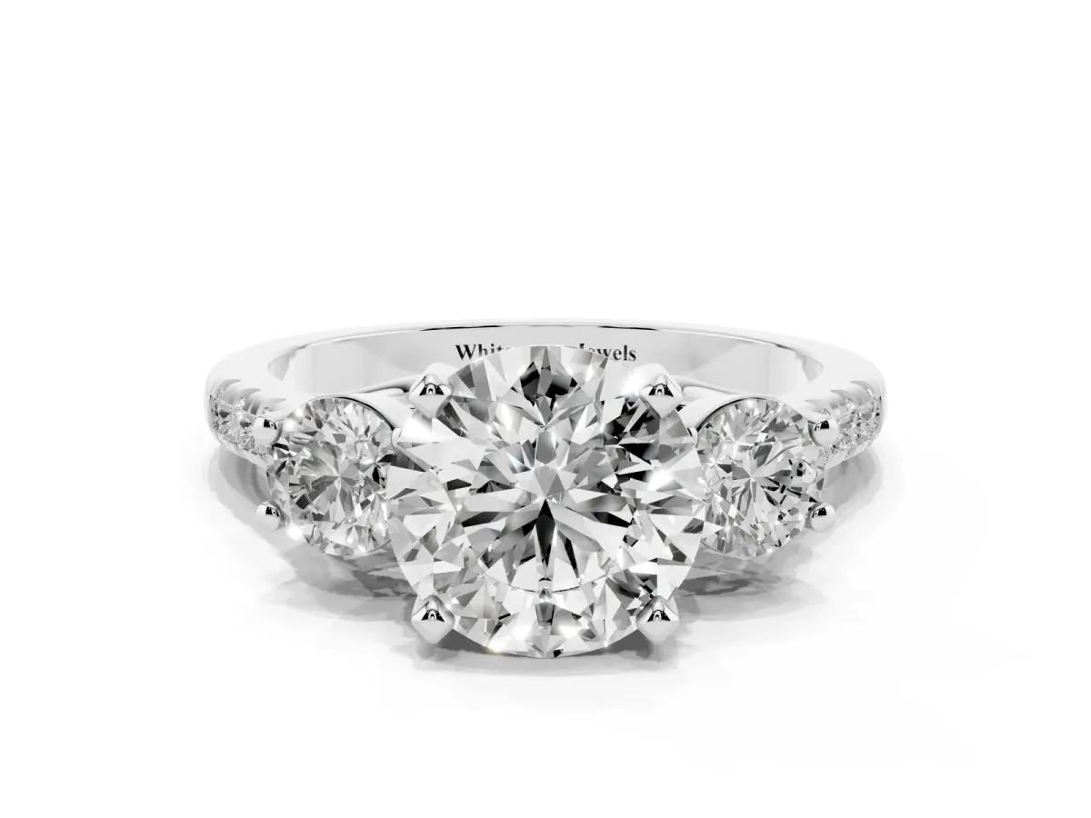 Three-Stone Round Cut Diamond Pavé Band with Four-Prong Setting Platinum