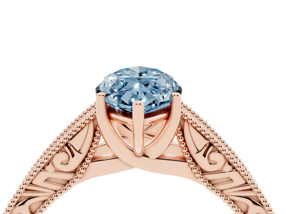 Fancy Blue Marquise Cut Diamond Solitaire Ring with Engraved Band and Four-Prong Setting Rose gold