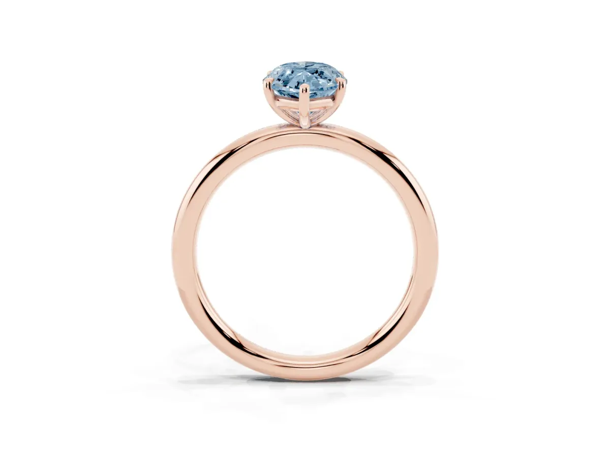 Fancy Blue Oval Cut Solitaire Diamond Ring with Four-Prong Setting on a Plain Band Rose gold