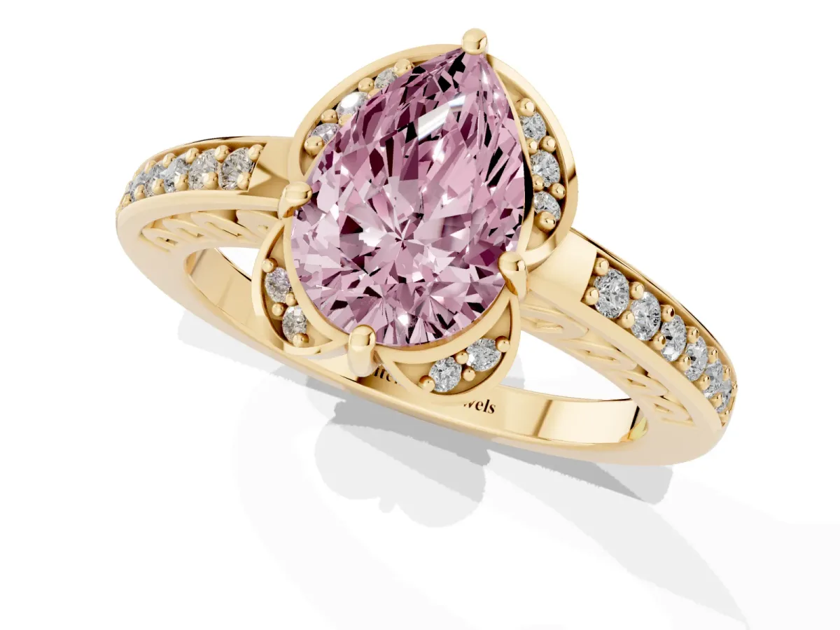 Fancy Pink Pear Cut Cut Halo Diamond Ring with Channel Set Band and Four-Prong Setting Yellow gold
