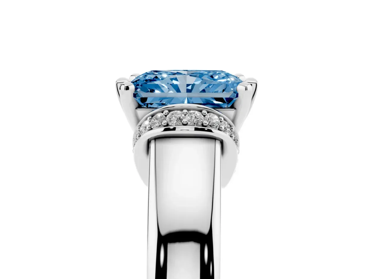 Fancy Blue Radiant Cut Solitaire Diamond Ring with Pave Band and Six-Prong Setting Silver