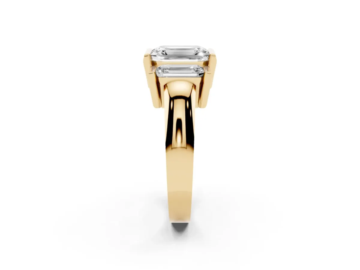 Three Stone Emerald Cut Cut Channel Set Diamond Ring Yellow gold