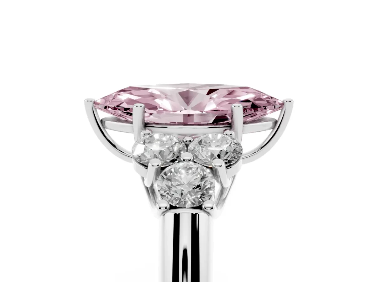 Fancy Pink Marquise Cut Cut Diamond Cluster Ring with Round Accent Stones and Prong Setting on a Classic Band Platinum