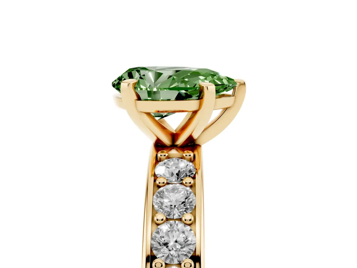 Fancy Green Pear Cut Diamond Engagement Ring with Channel Set Round Band and Prong Setting Yellow gold