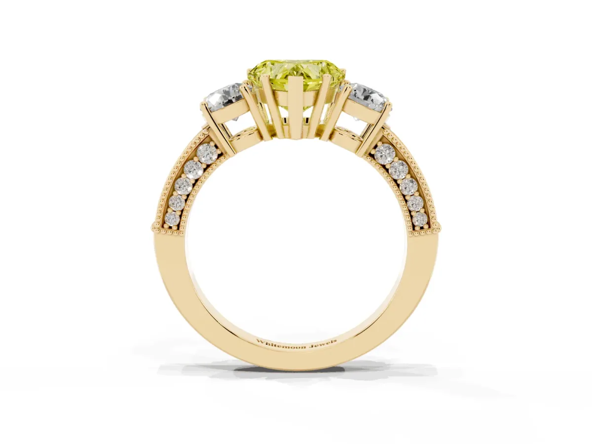 Fancy Yellow Heart Cut Three-Stone Diamond Ring with Pavé Band and Four-Prong Setting Yellow gold