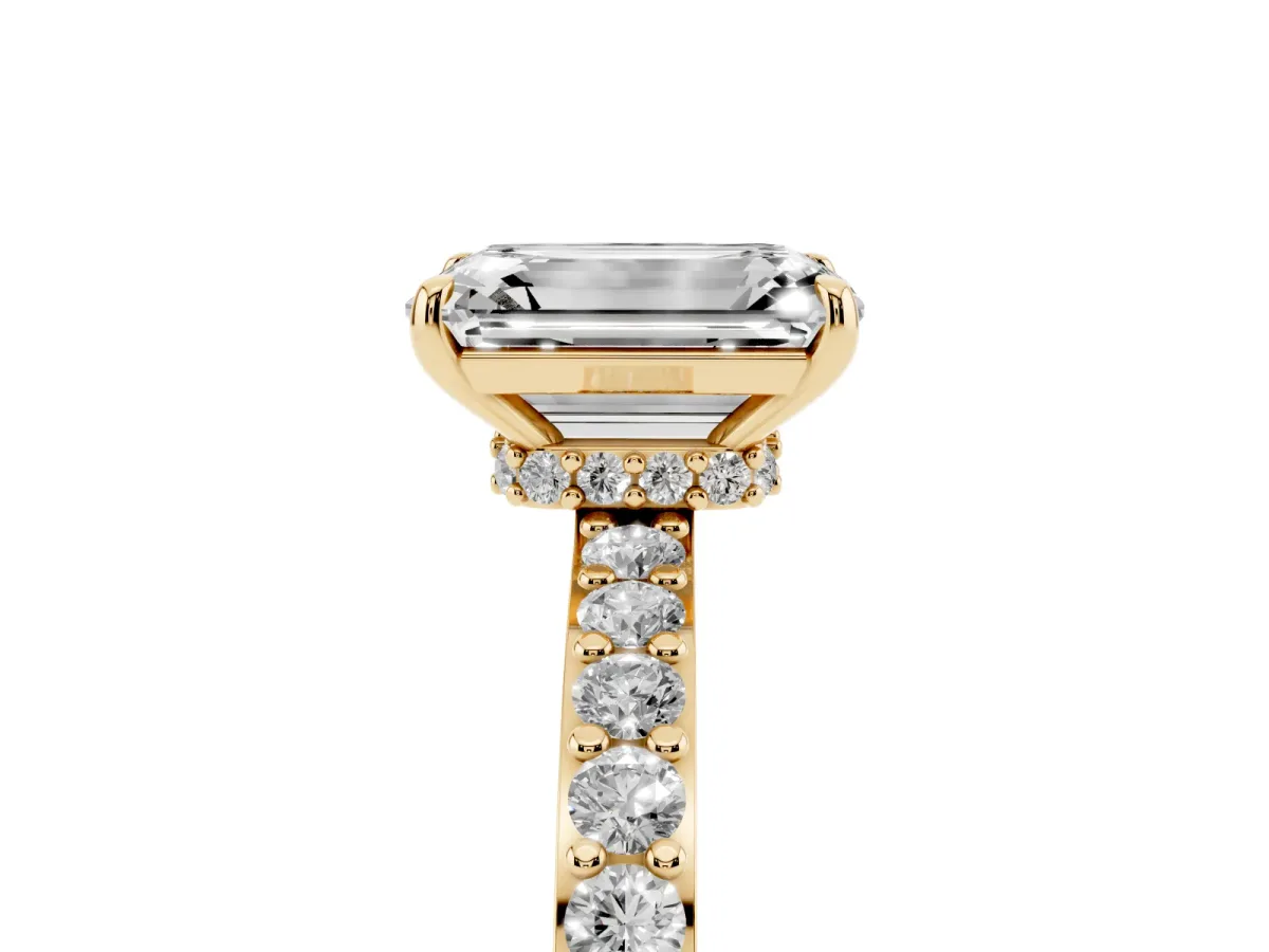 Emerald Cut Diamond Pavé Engagement Ring with Round Accents and Prong Setting Yellow gold