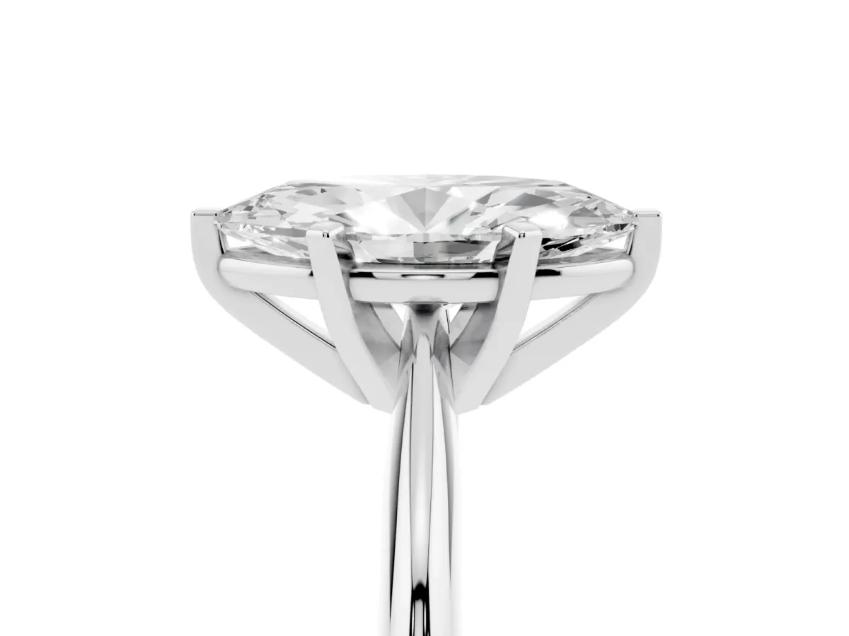 Marquise Cut Cut Solitaire Ring with Four-Prong Setting on a Classic Band Silver