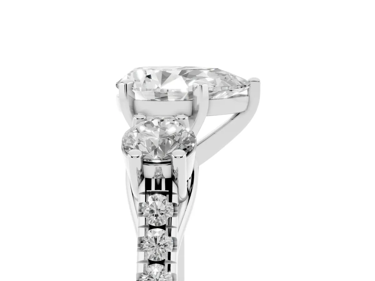 Three-Stone Pear Cut Diamond Pavé Band with Four-Prong Setting Platinum