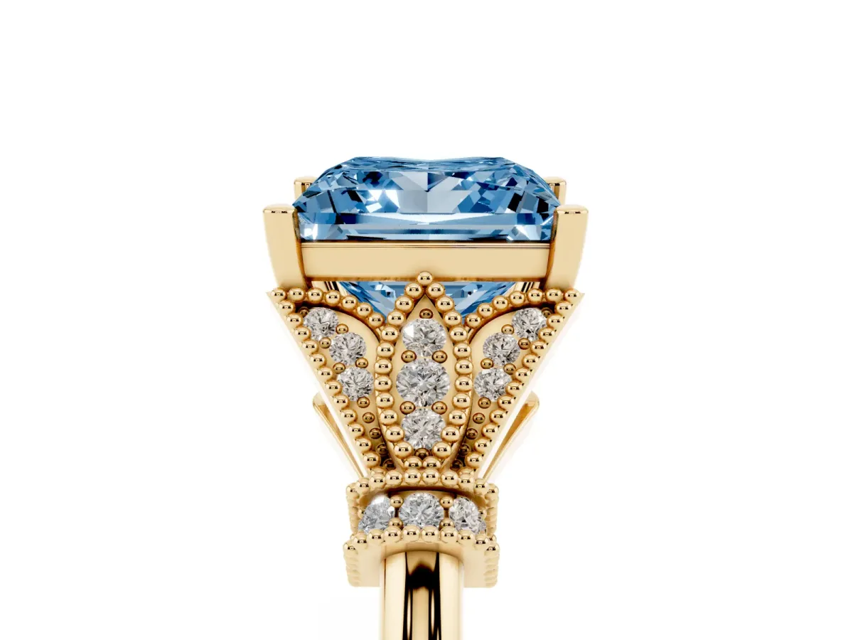 Fancy Blue Princess Cut Diamond Solitaire Ring with Floral Filigree and Pave Accents Yellow gold