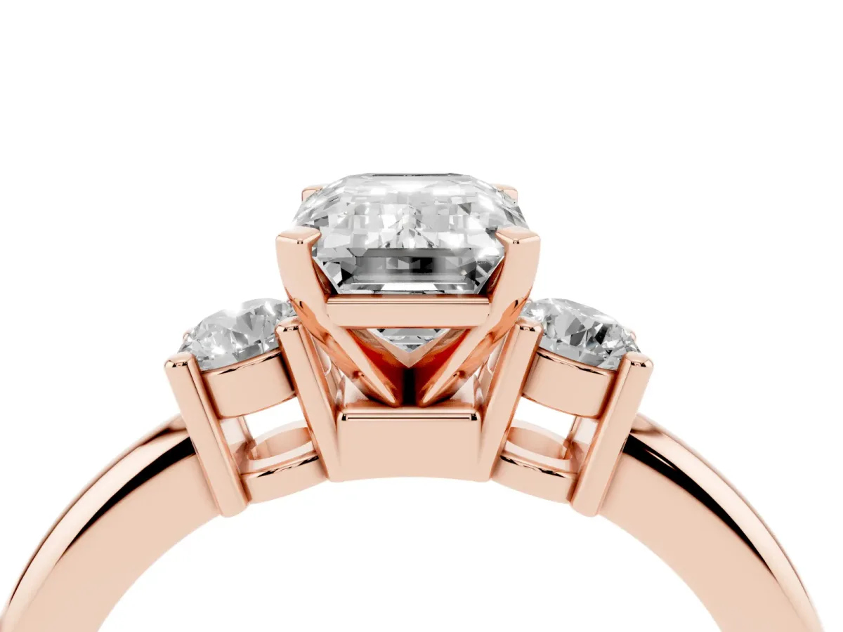 Three-Stone Emerald Cut Cut Diamond Solitaire with Prong Setting and Classic Band Rose gold