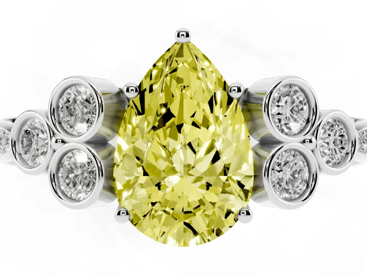 Fancy Yellow Pear Cut Cut Diamond Engagement Ring with Bezel Set Round Side Stones and Prong Setting Silver