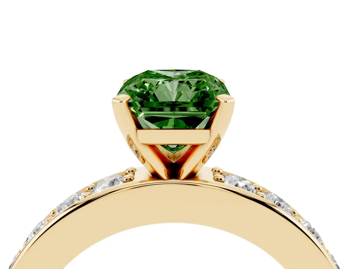 Fancy Green Radiant Cut Diamond Engagement Ring with Channel Set Round Band and Prong Setting Yellow gold