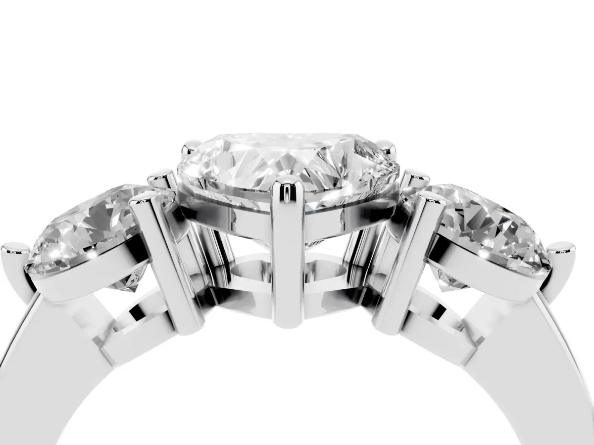 Three-Stone Heart Cut Brilliant Cut Solitaire Ring with Prong Setting on a Classic Band Silver