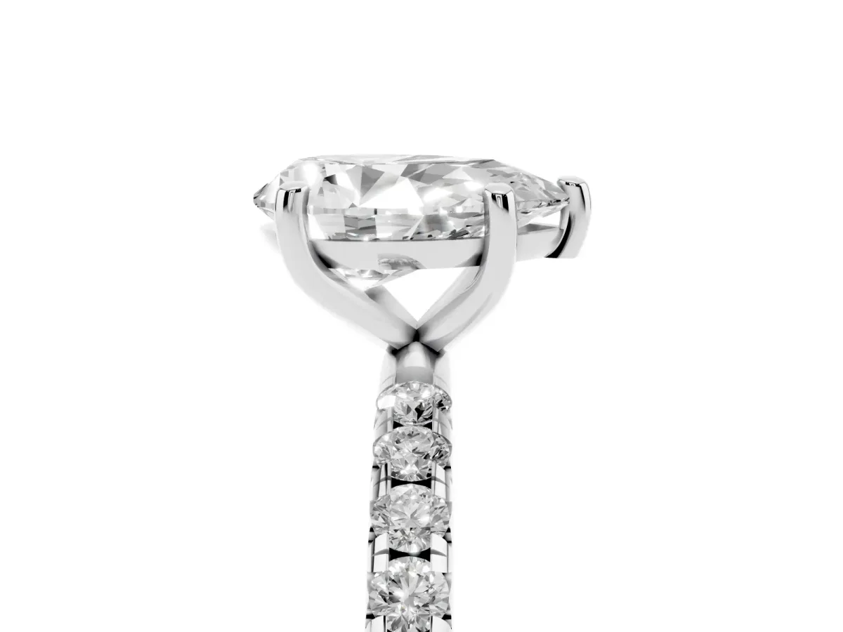 Pear Cut Cut Diamond Solitaire Ring with Micro Pave Band and Four Prong Setting Silver