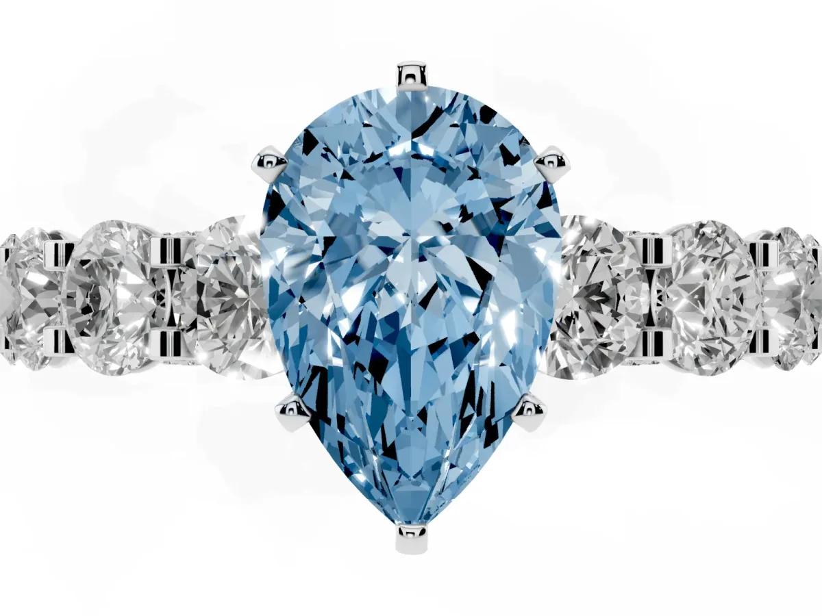 Fancy Blue Pear Cut Diamond Side Stone Engagement Ring with Four-Prong Setting White gold
