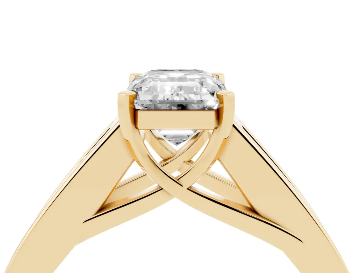 Emerald Cut Cut Channel Set Solitaire Ring with Four-Prong Setting Yellow gold