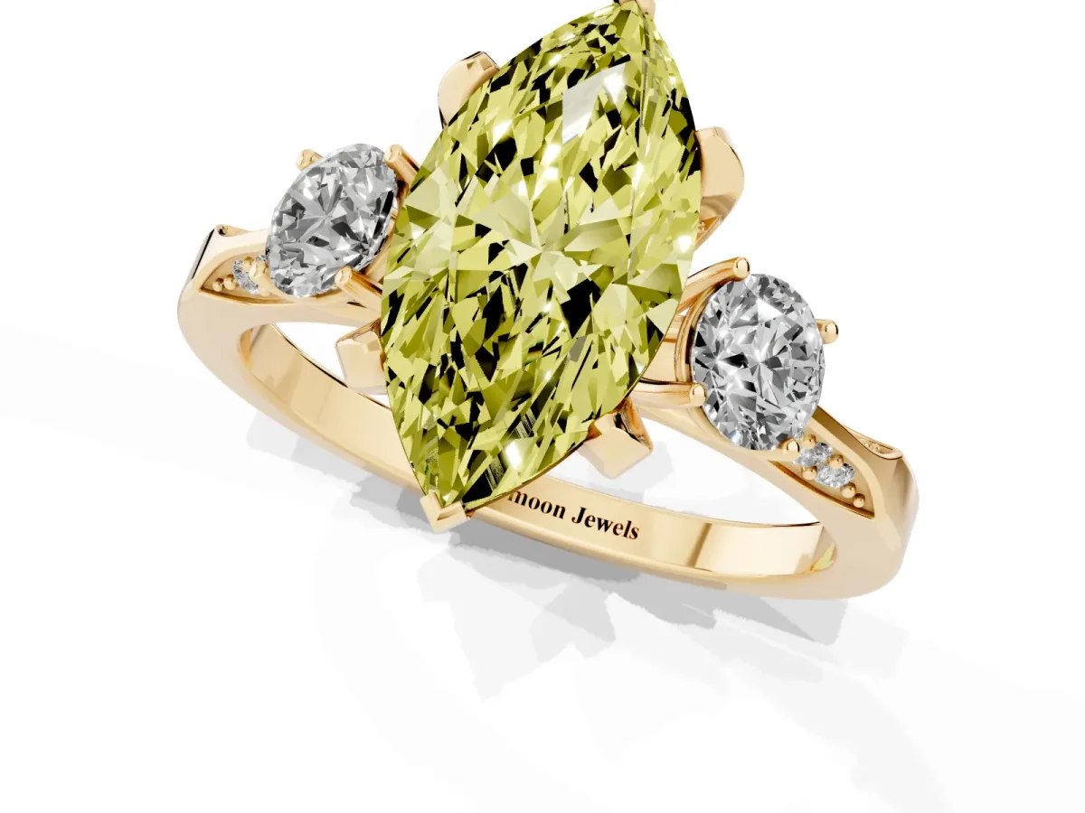 Fancy Yellow Marquise Cut Brilliant Three-Stone Diamond Ring with Pavé Band and Four-Prong Setting Yellow gold
