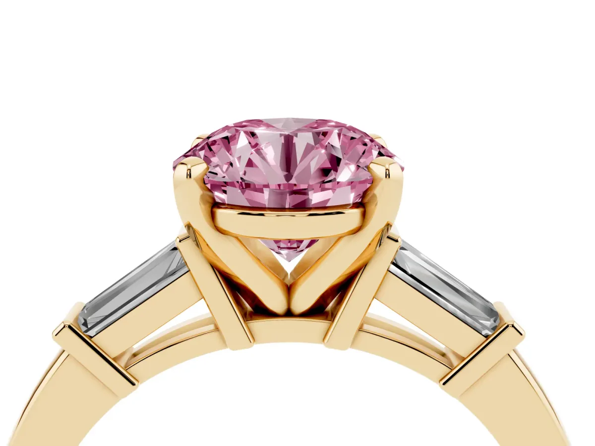 Fancy Pink Round Cut Cut Diamond Solitaire Ring with Tapered Baguette Accents and Four-Prong Setting Yellow gold