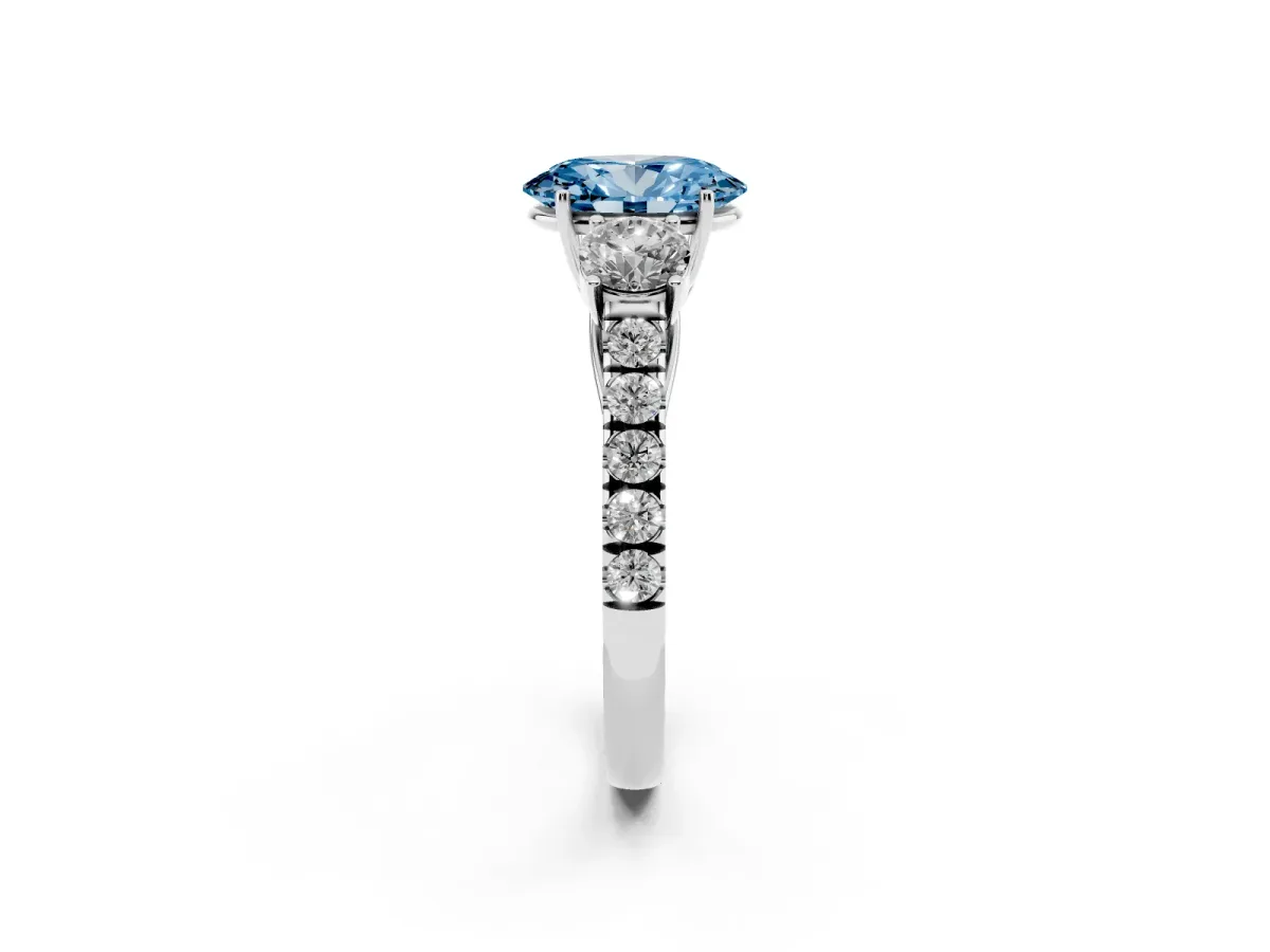 Fancy Blue Oval Cut Cut Diamond Three-Stone Ring with Round Side Stones and Pavé Band Silver