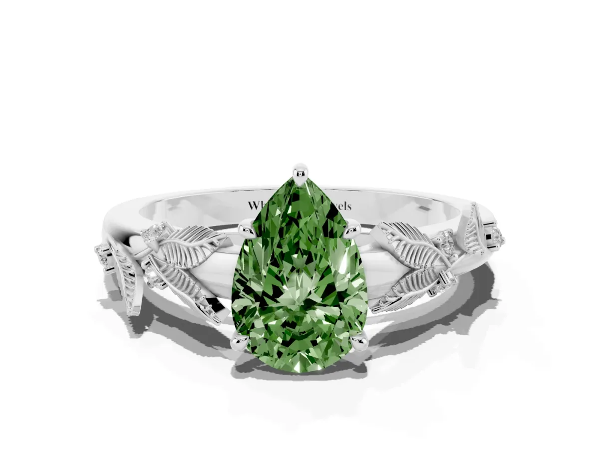Fancy Green Pear Cut Diamond Solitaire Ring with Leaf Motif Band and Four-Prong Setting Silver