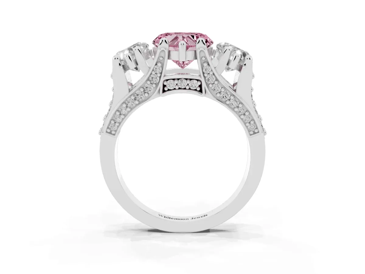 Fancy Pink Heart Cut Diamond Three-Stone Ring with Channel Set Band and Four-Prong Setting Silver