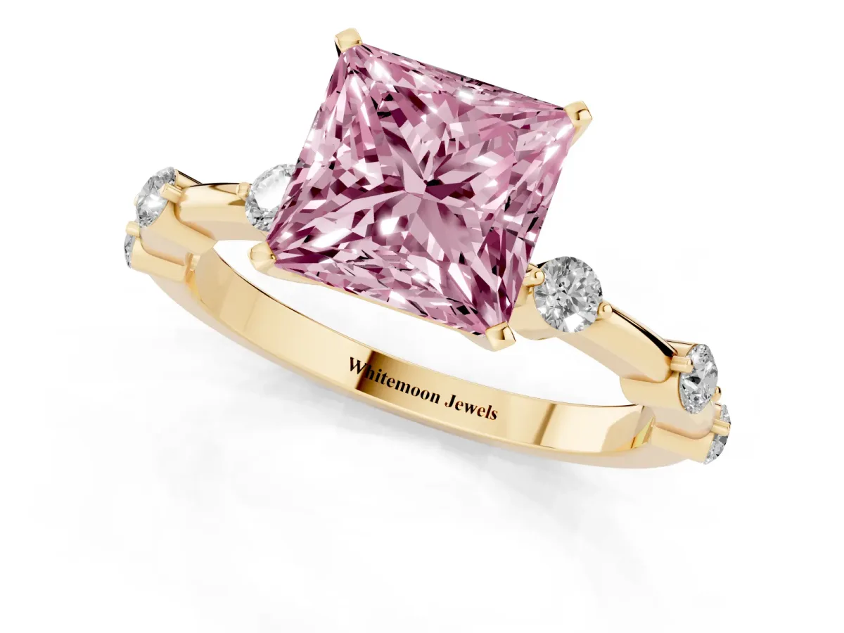 Fancy Pink Princess Cut Solitaire Diamond Ring with Bezel Set Side Stones and Prong Setting Yellow gold