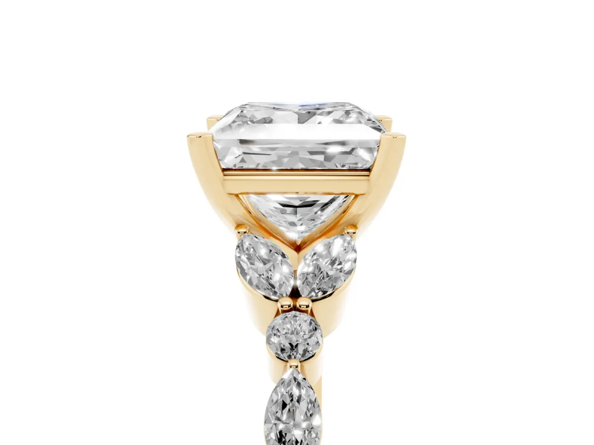 Princess Cut Diamond Solitaire Ring with Side Stones and Four-Prong Setting Yellow gold