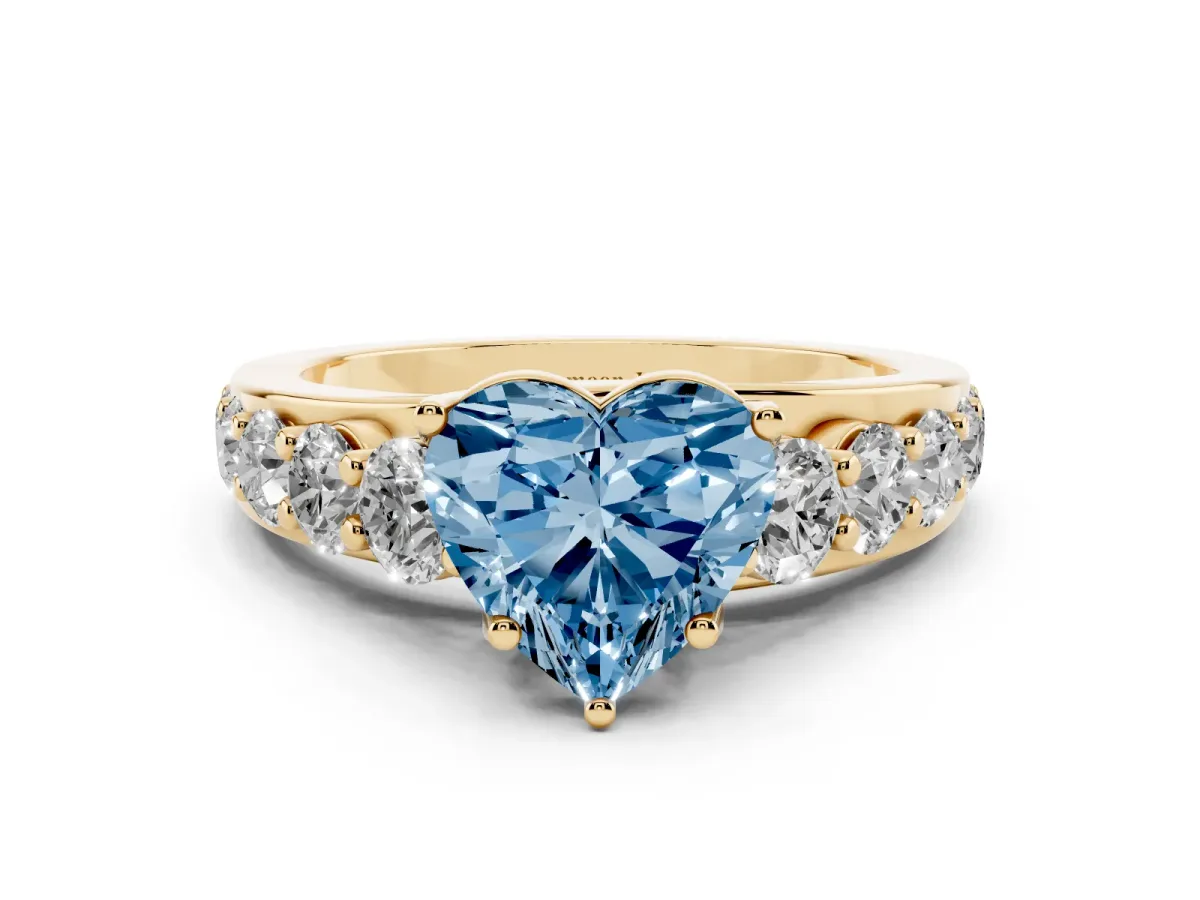 Fancy Blue Heart Cut Diamond Engagement Ring with Pavé Band and Four-Prong Setting Yellow gold