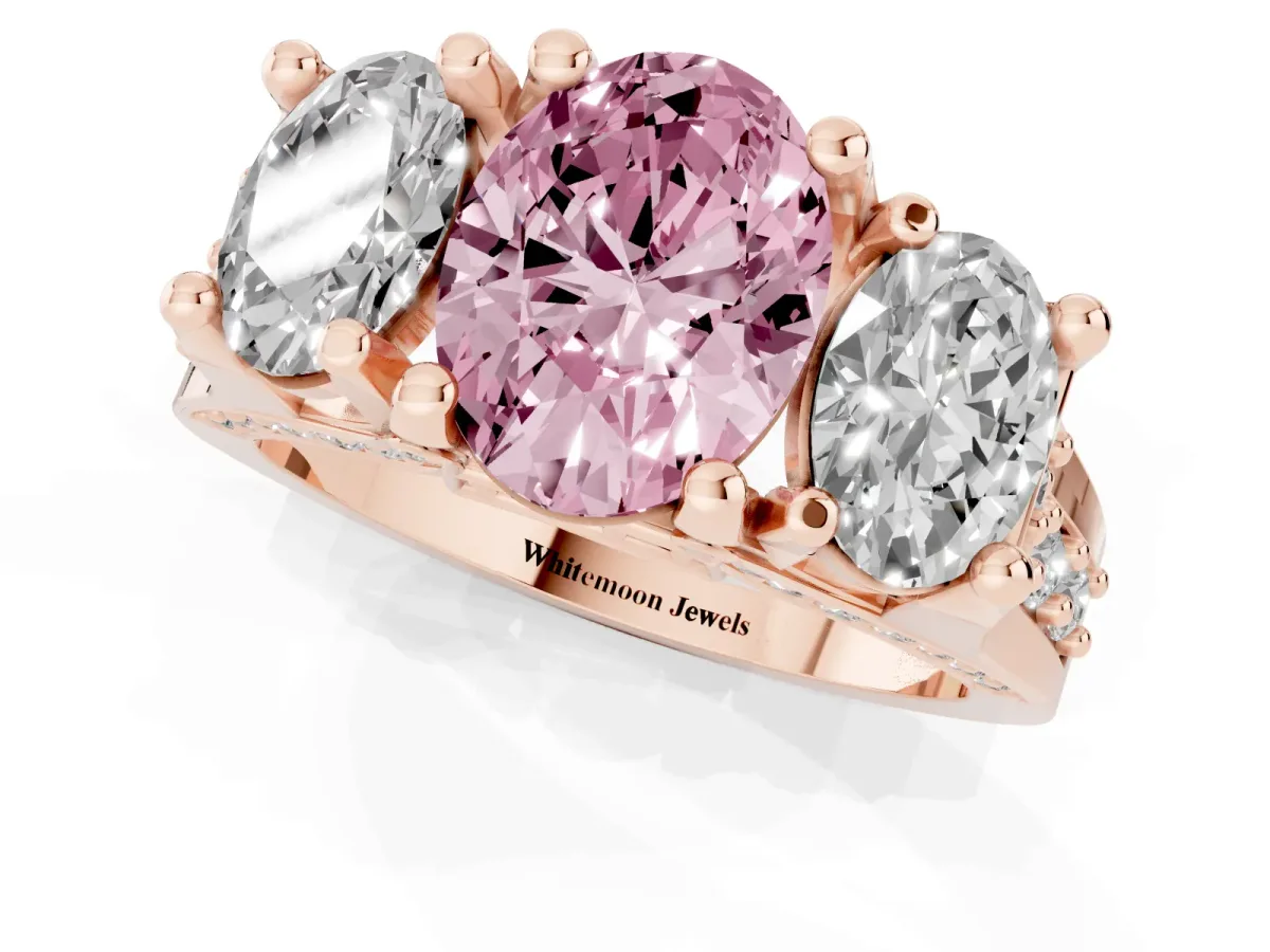 Fancy Pink Oval Cut Diamond Three-Stone Ring with Channel Set Band and Four-Prong Setting Rose gold