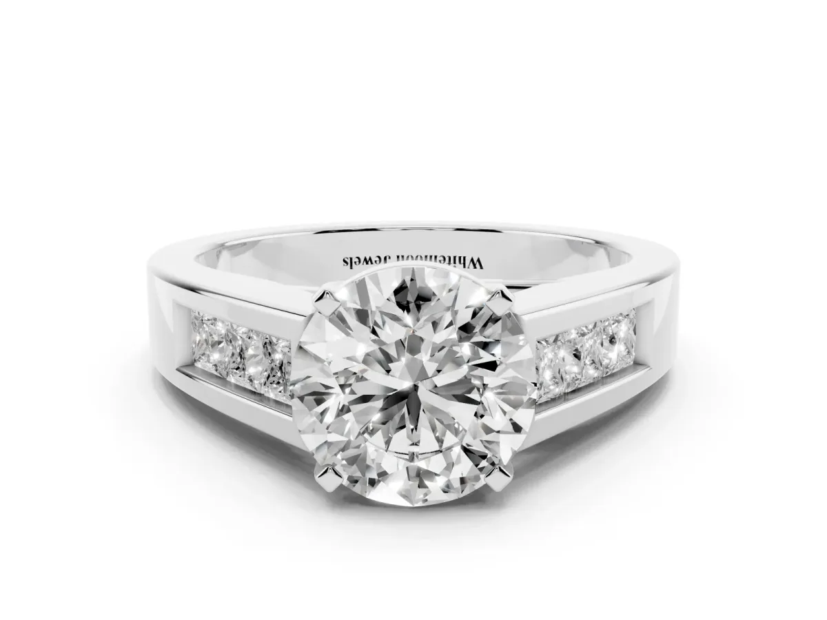 Round Cut Cut Channel Set Solitaire Ring with Four-Prong Setting Silver