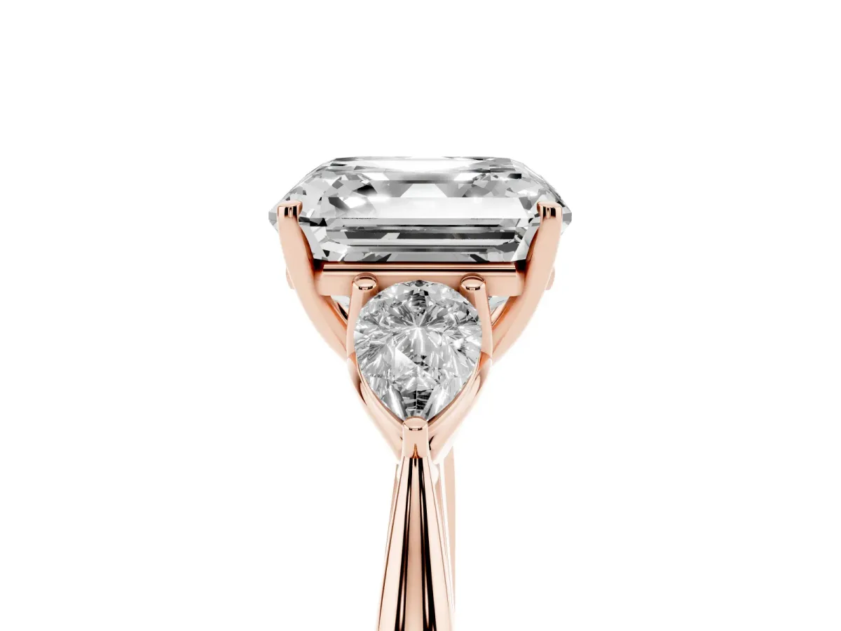 Three-Stone Asscher Cut Diamond Ring with Pear Side Stones in Four-Prong Setting Rose gold