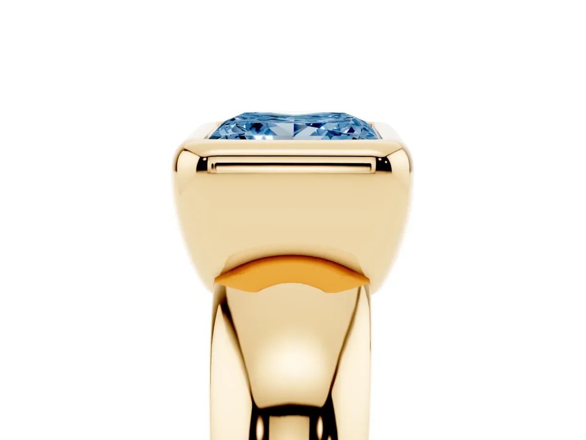Fancy Blue Bezel Set Princess Cut Solitaire Ring with Wide Band Yellow gold