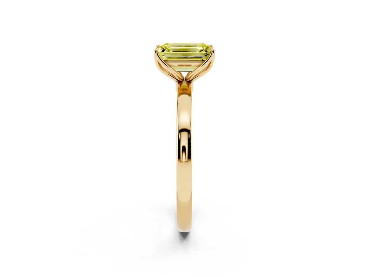 Fancy Yellow Emerald Cut Diamond Solitaire Ring with Thin Band and Prong Setting Yellow gold