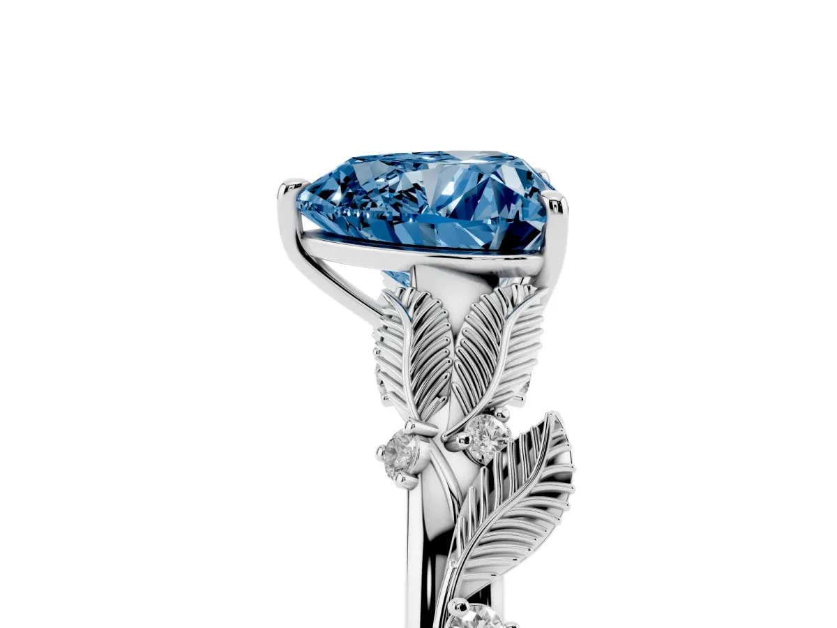 Fancy Blue Heart Cut Diamond Solitaire Ring with Leaf Motif Band and Four-Prong Setting Platinum