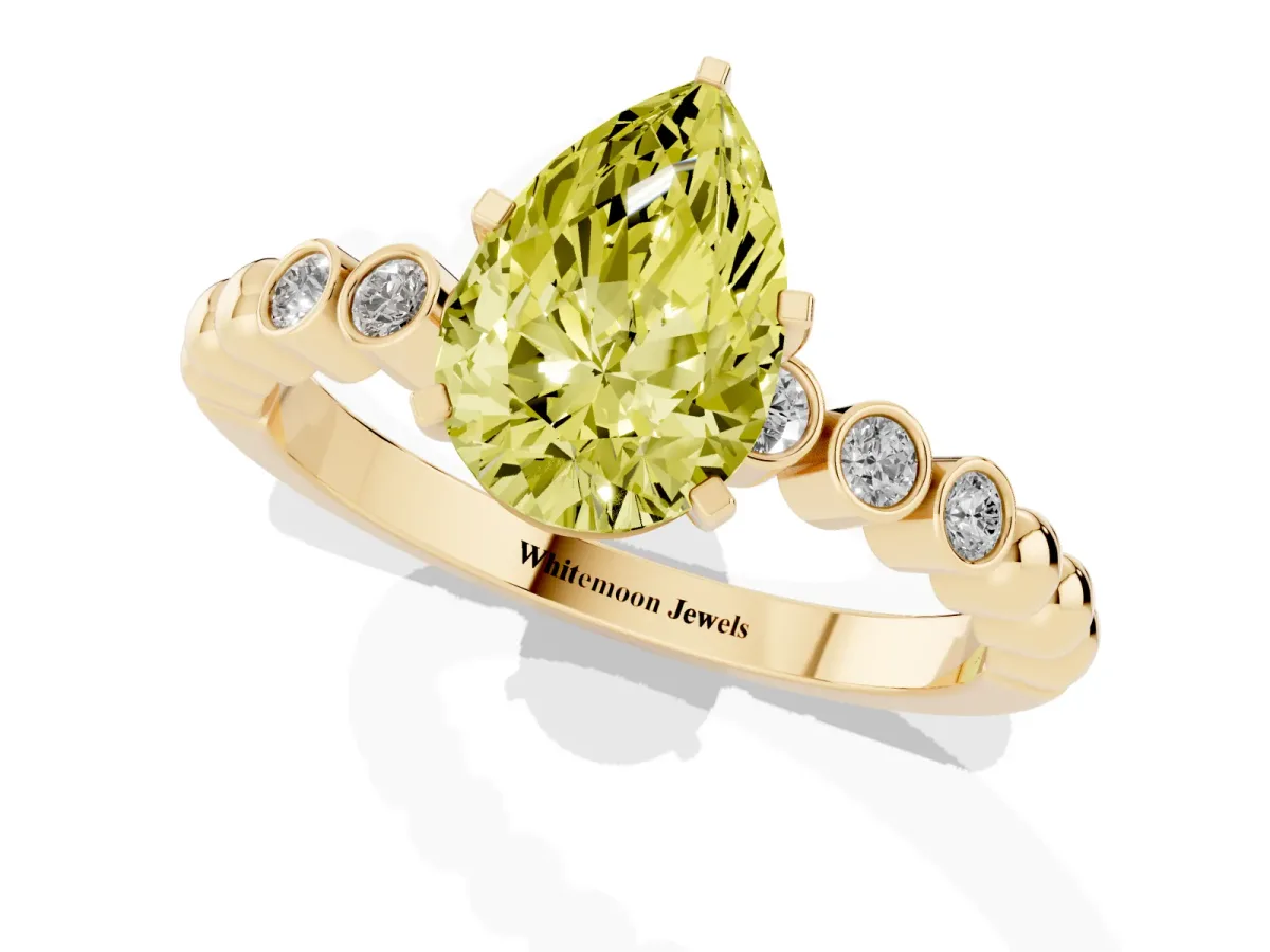 Fancy Yellow Pear Cut Solitaire Bezel Accent Diamond Engagement Ring with Beaded Band and Four-Prong Setting Yellow gold