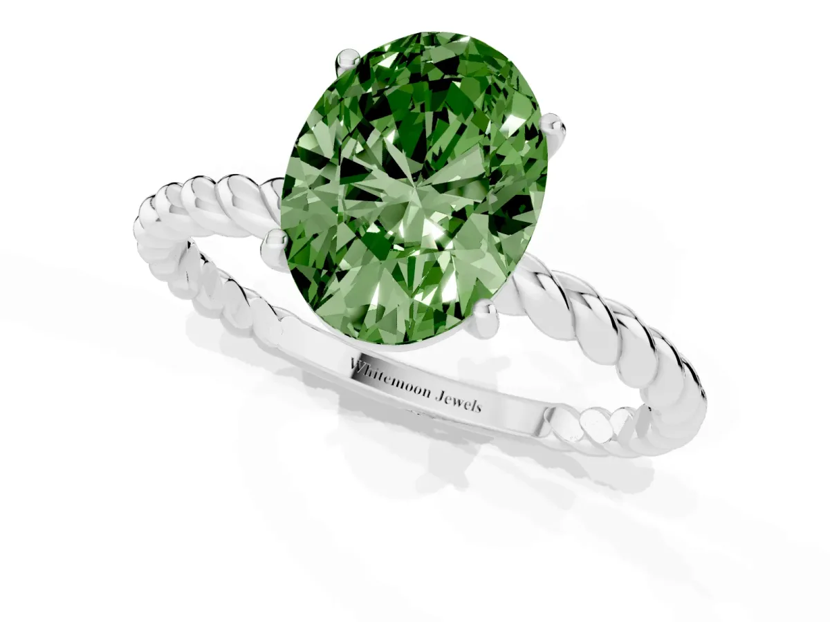 Fancy Green Oval Cut Solitaire Twist Band Ring with Four-Prong Setting Silver