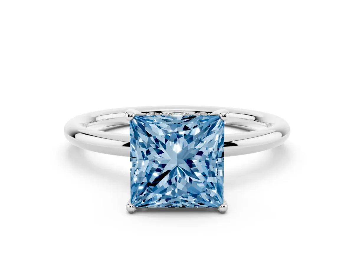 Fancy Blue Princess Cut Solitaire Diamond Ring with a Classic Band and Four-Prong Setting Silver