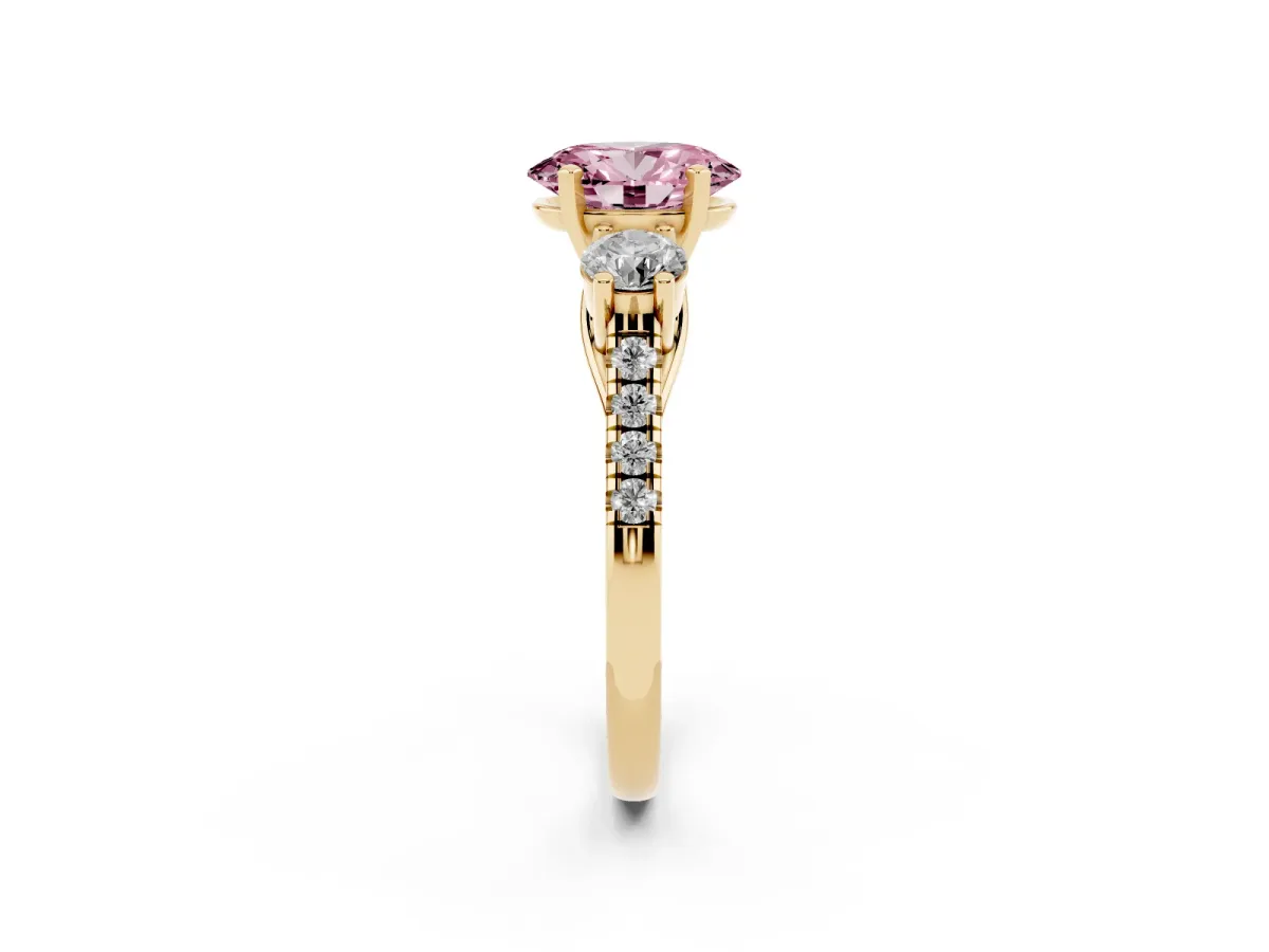 Fancy Pink Three-Stone Oval Cut Diamond Pavé Band with Four-Prong Setting Yellow gold