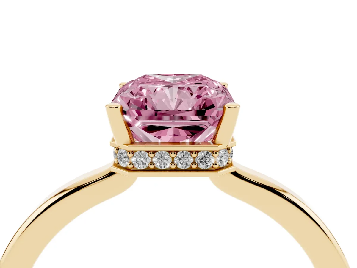 Fancy Pink Radiant Cut Cut Solitaire Engagement Ring with Four-Prong Setting on a Classic Band Yellow gold