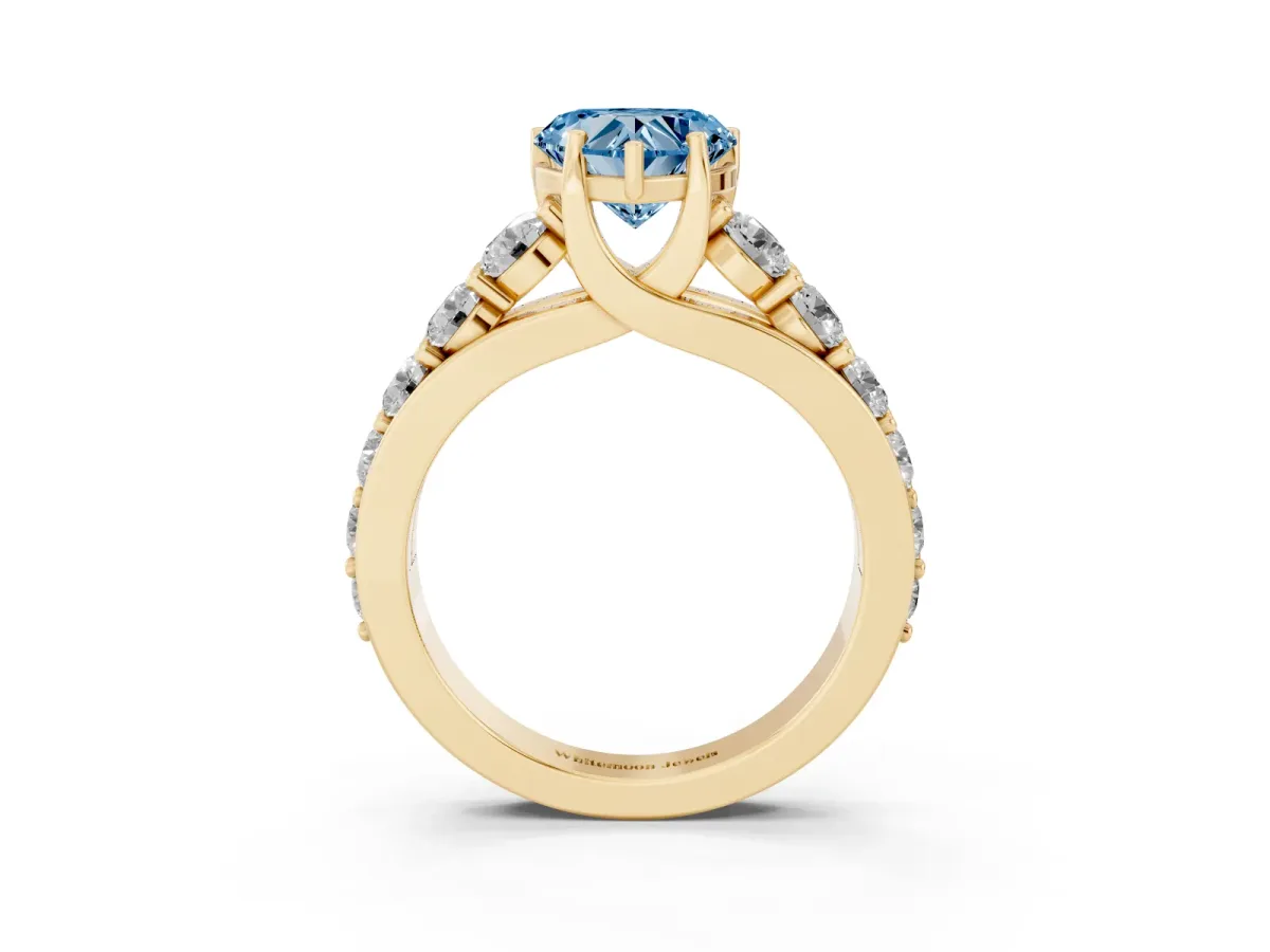 Fancy Blue Heart Cut Diamond Engagement Ring with Pavé Band and Four-Prong Setting Yellow gold